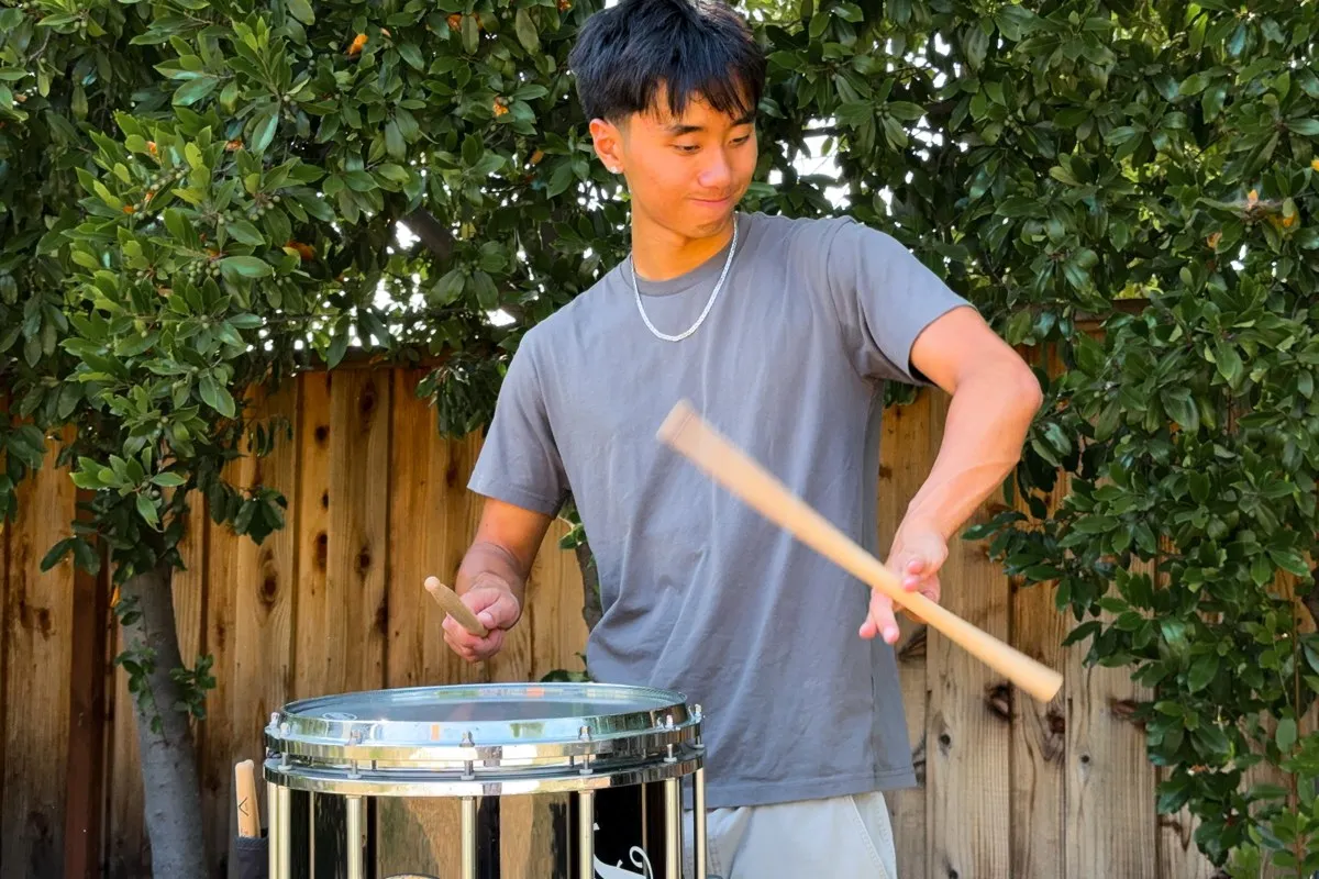 Damon Uyehara playing snare drum