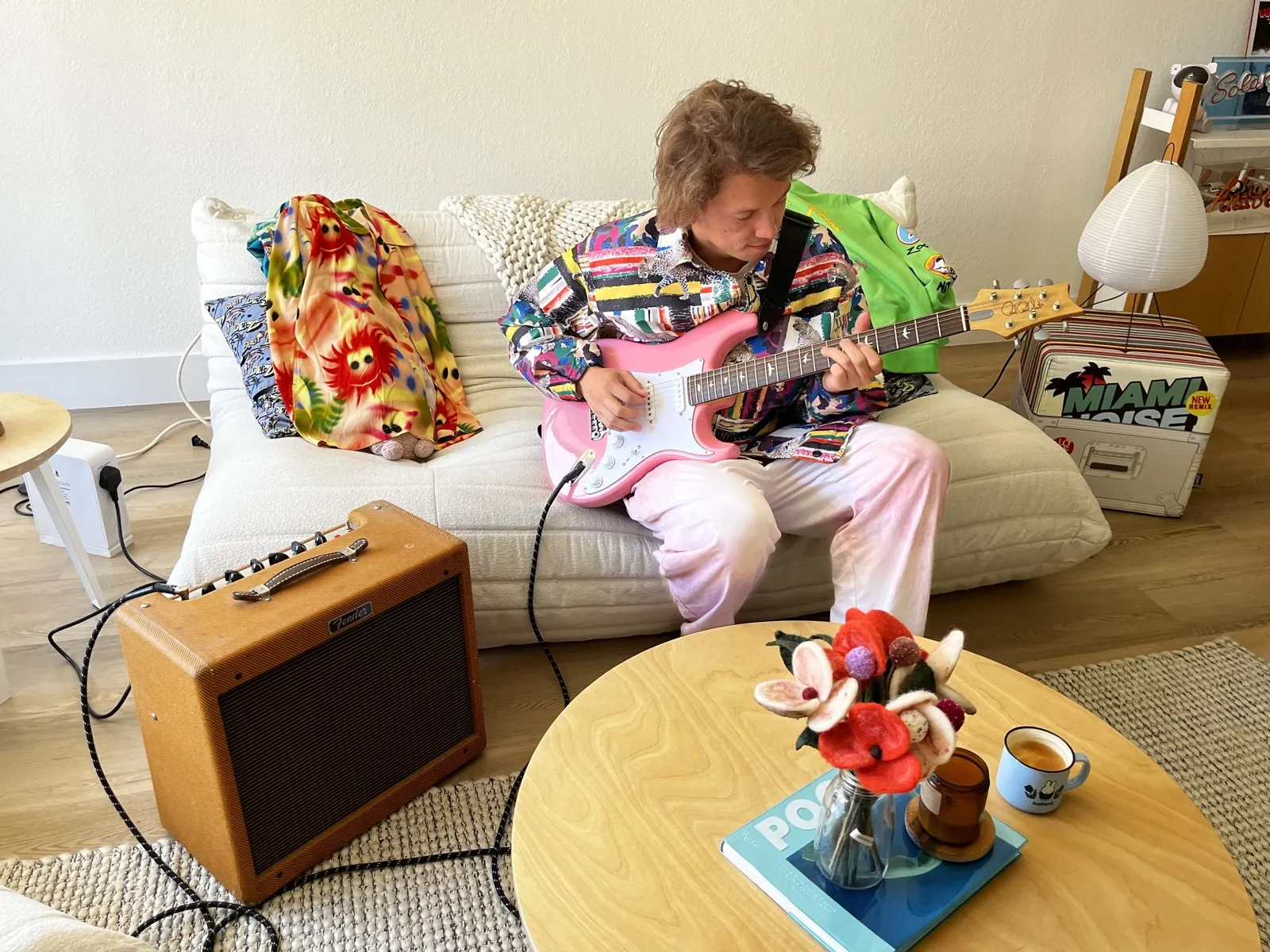 Lukas Janecek playing electric guitar