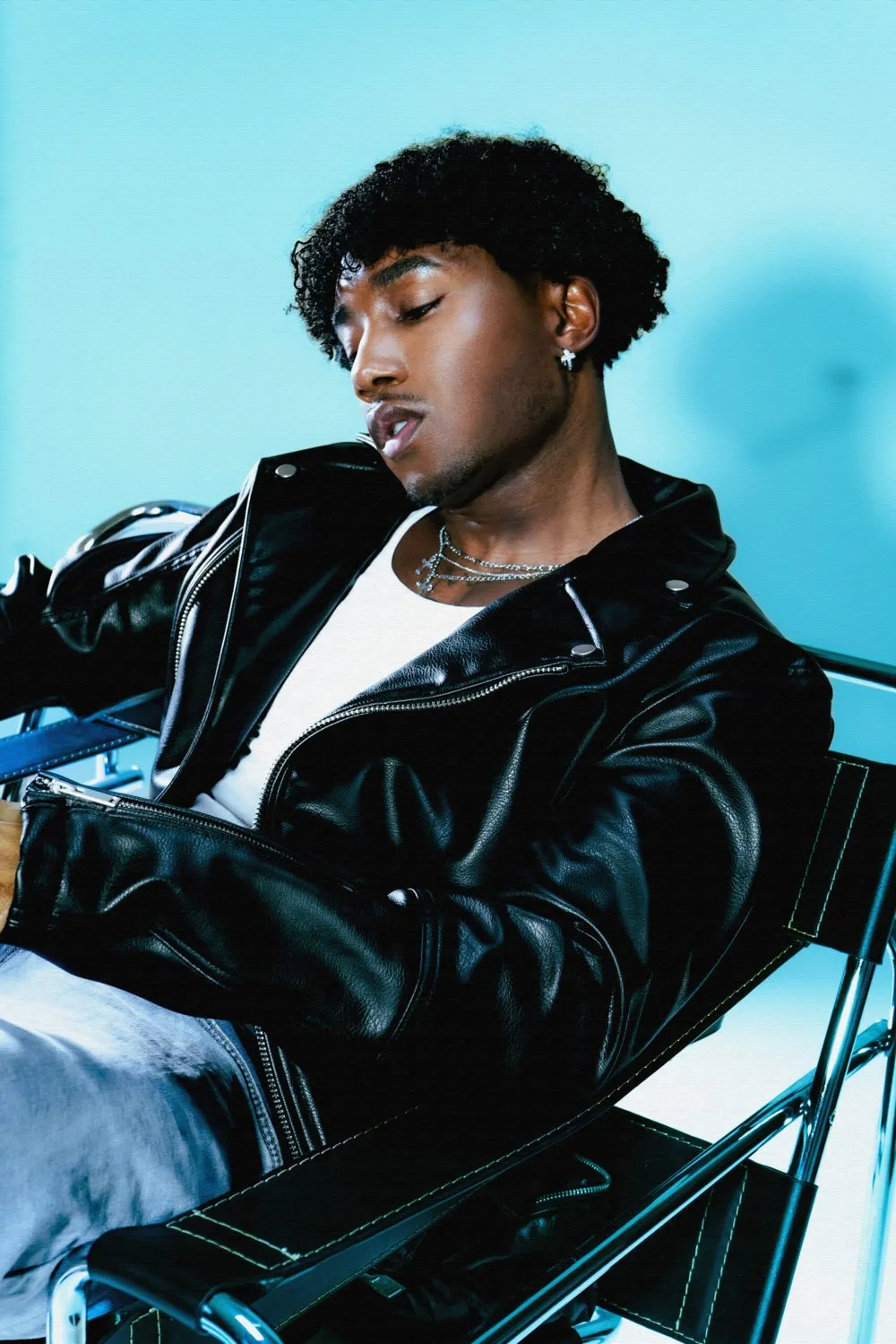 Steven Christopher photographed in a black leather jacket